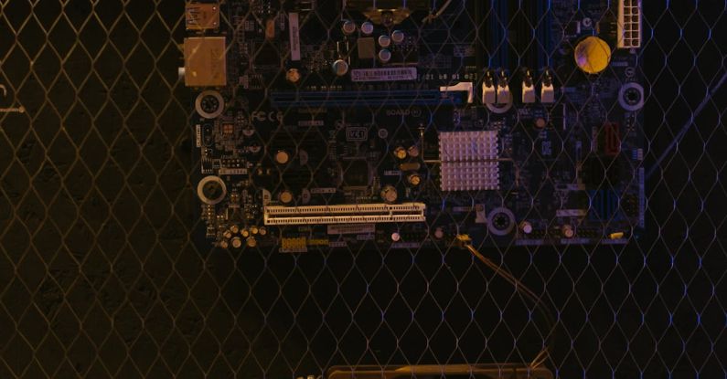 Tech Integration - Motherboard and Fan Behind Wire Mesh